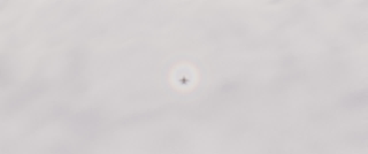 The jet's shadow and the glory 150 metres above a cloud deck