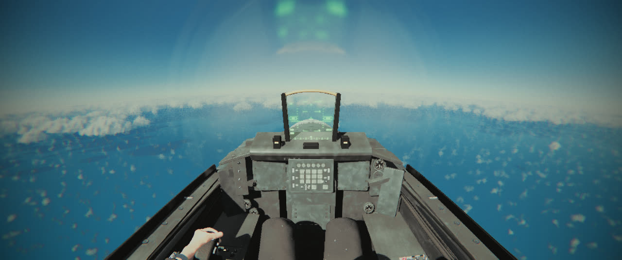 The F-16 cockpit from the helmet camera at 12,000 feet over the sea